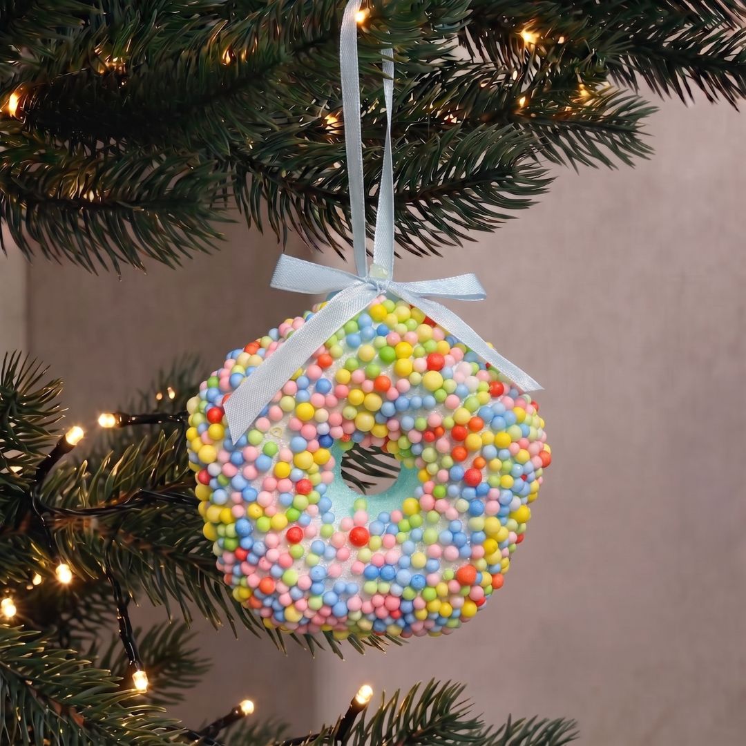 Candyland hanging Tiffany blue donut ornament with colorful sprinkles, styled as a festive Christmas decoration in Singapore.