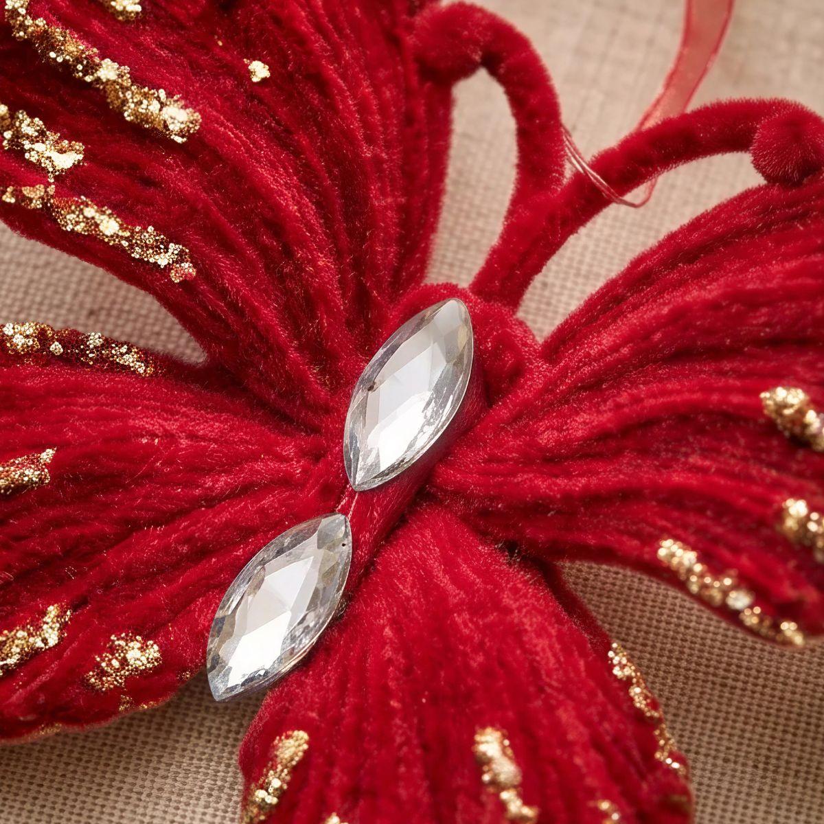 Deep red velvet Christmas tree decorations with elegant texture