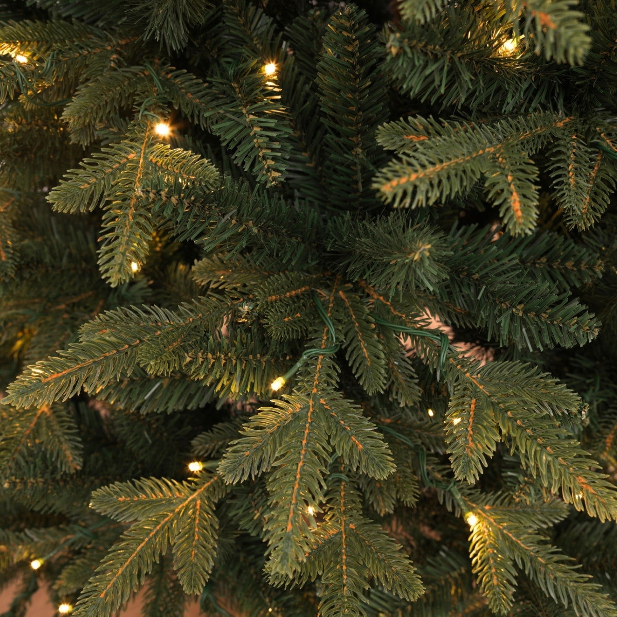 Close-up of realistic Florentine Fraser Fir Christmas tree branches crafted from sustainable plant oils. A luxury choice over Masons Home Decor in Singapore.