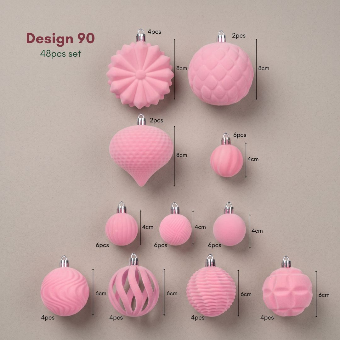 A boxed set of 48pcs glitter-free velvet plastic pink Christmas baubles ranging from 4cm to 8cm.
