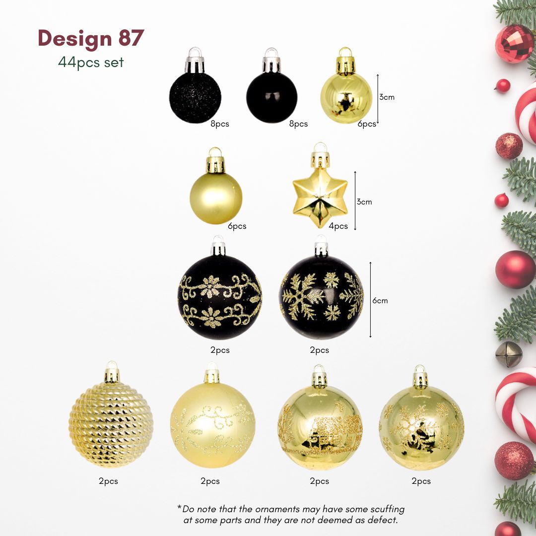 A glamorous Christmas tree in a Singapore home decorated with classic black and gold glossy and glitter baubles.