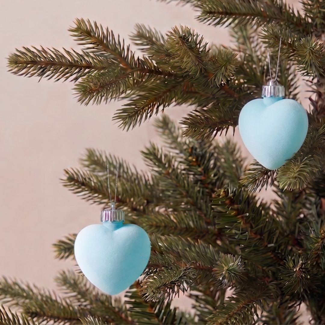 Premium blue velvet Christmas bauble with a non-glitter finish, ideal for decorating artificial Christmas trees in Singapore