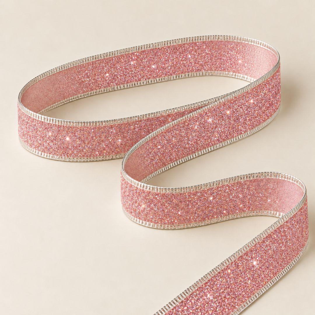 Blush pink glitter Christmas ribbon with wired edges, 5.5cm wide and 10m long, ideal for Christmas tree bows, wreaths, garlands and festive decorations.