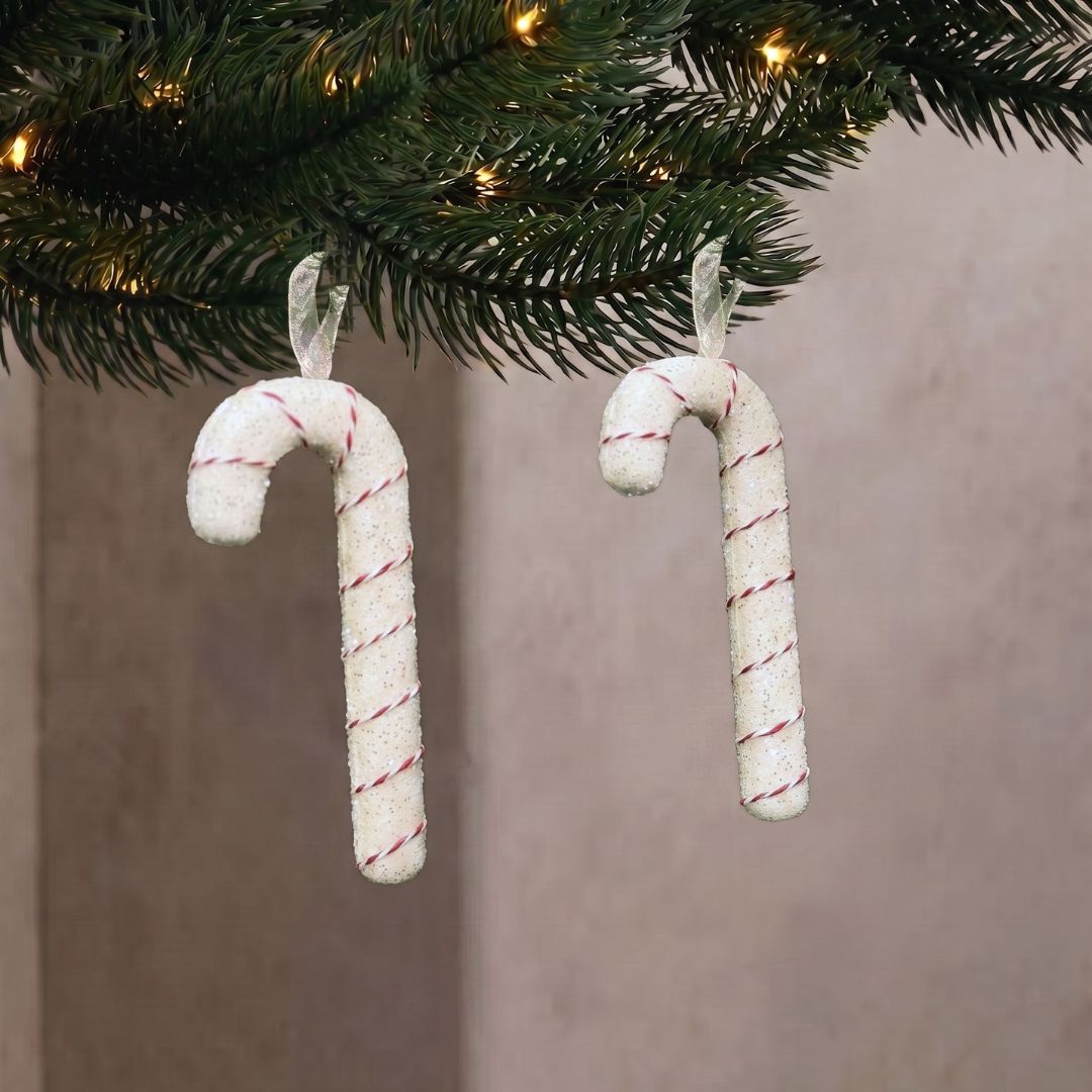 Candyland hanging pastel candy cane ornament with textured sprinkles, styled as a whimsical Christmas decoration in Singapore.