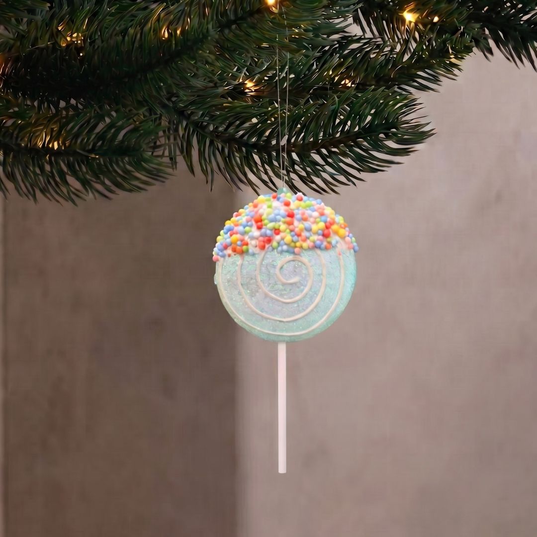 Candyland hanging pastel lollipop ornament with colorful sprinkles, styled as a whimsical Christmas decoration in Singapore.