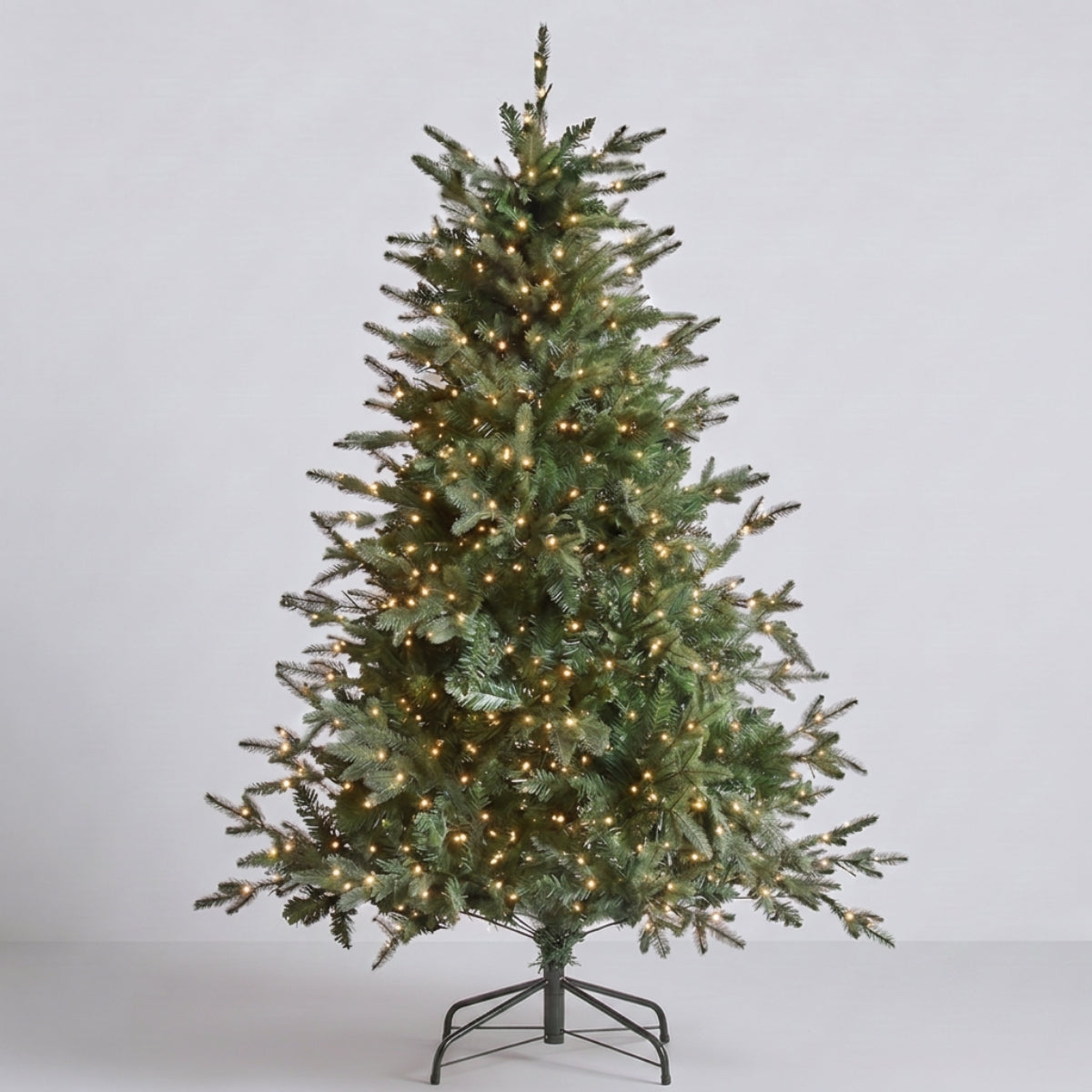 Pre-lit Florentine Fraser Fir Christmas tree featuring warm LED lights and dense foliage by Speckled Space, a premium alternative to Masons Home Decor in Singapore.