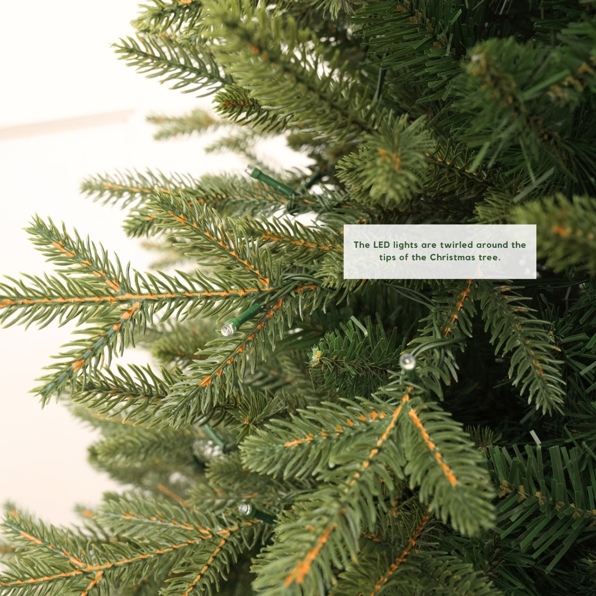 Detailed view of the specific 'Fraser Fir' PE and PVC needle tips, showcasing realistic color and texture. An excellent choice to compare against Pine Concept's densest artificial trees in Singapore.