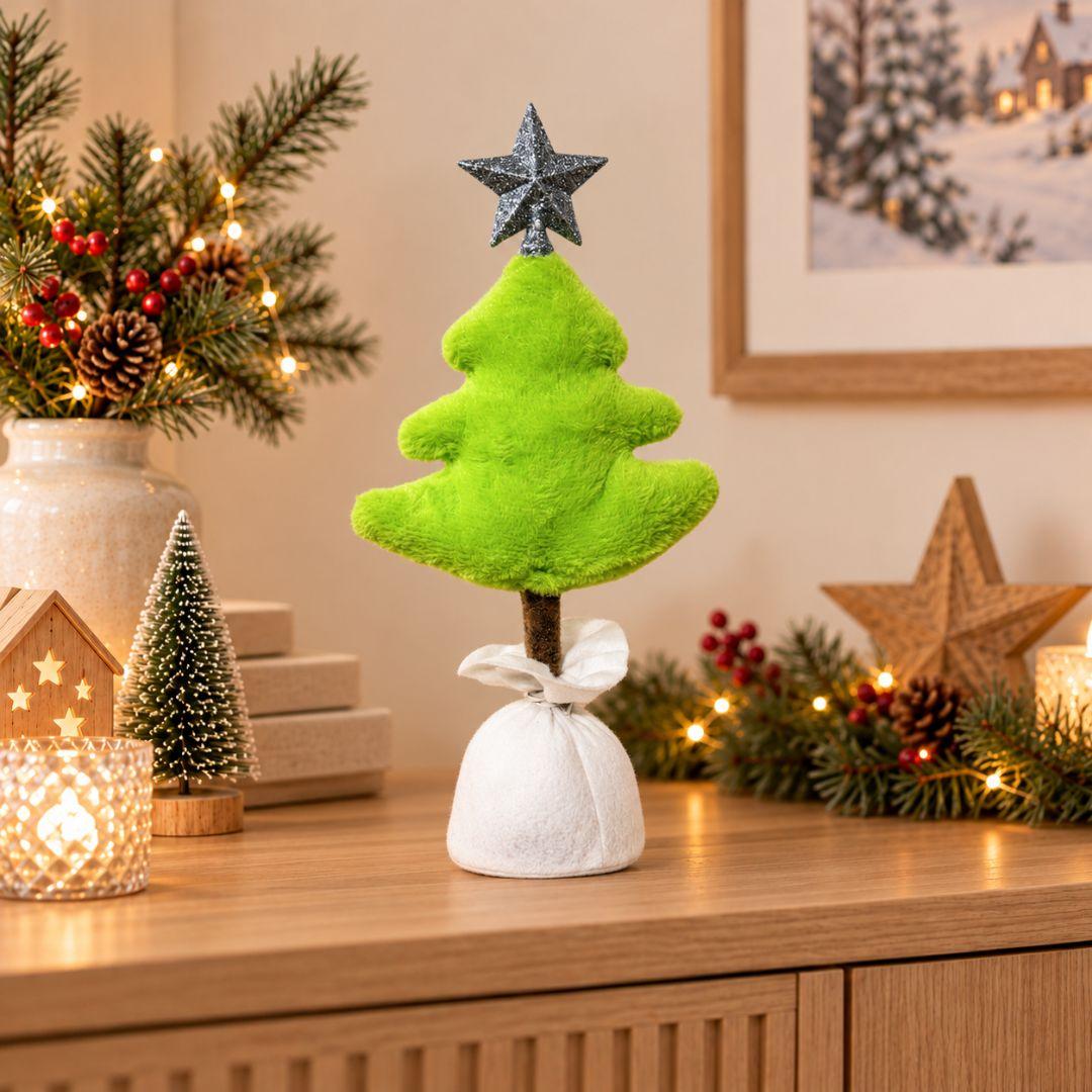Noel Christmas Plush Design G, 45cm tall lime green fluffy tabletop Christmas tree featuring a glittery silver star topper, brown trunk and white fabric-wrapped base, displayed on a wooden sideboard.