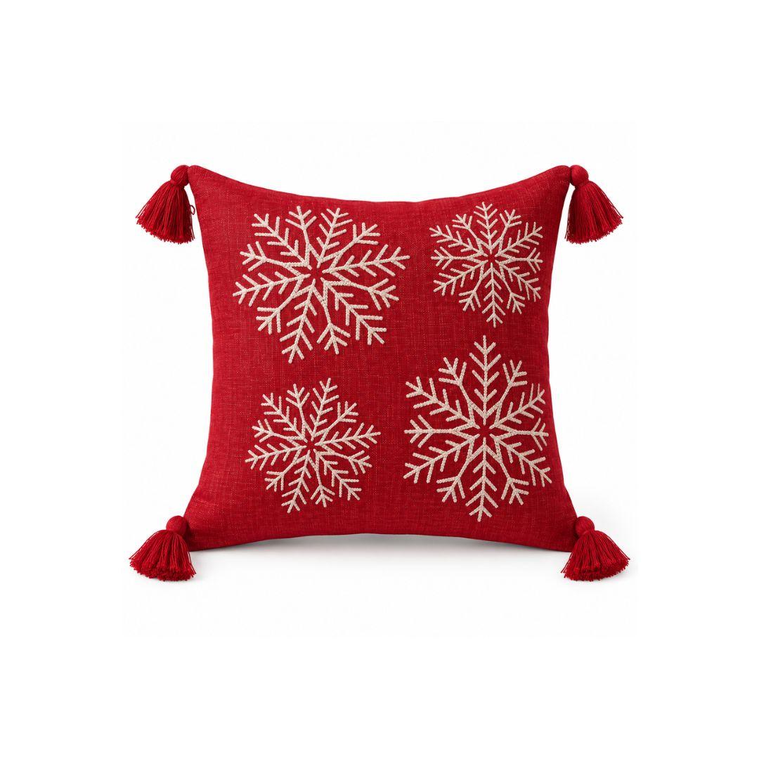 Red Winterberry Frost Christmas cushion cover with cream embroidered snowflakes and red tassels.