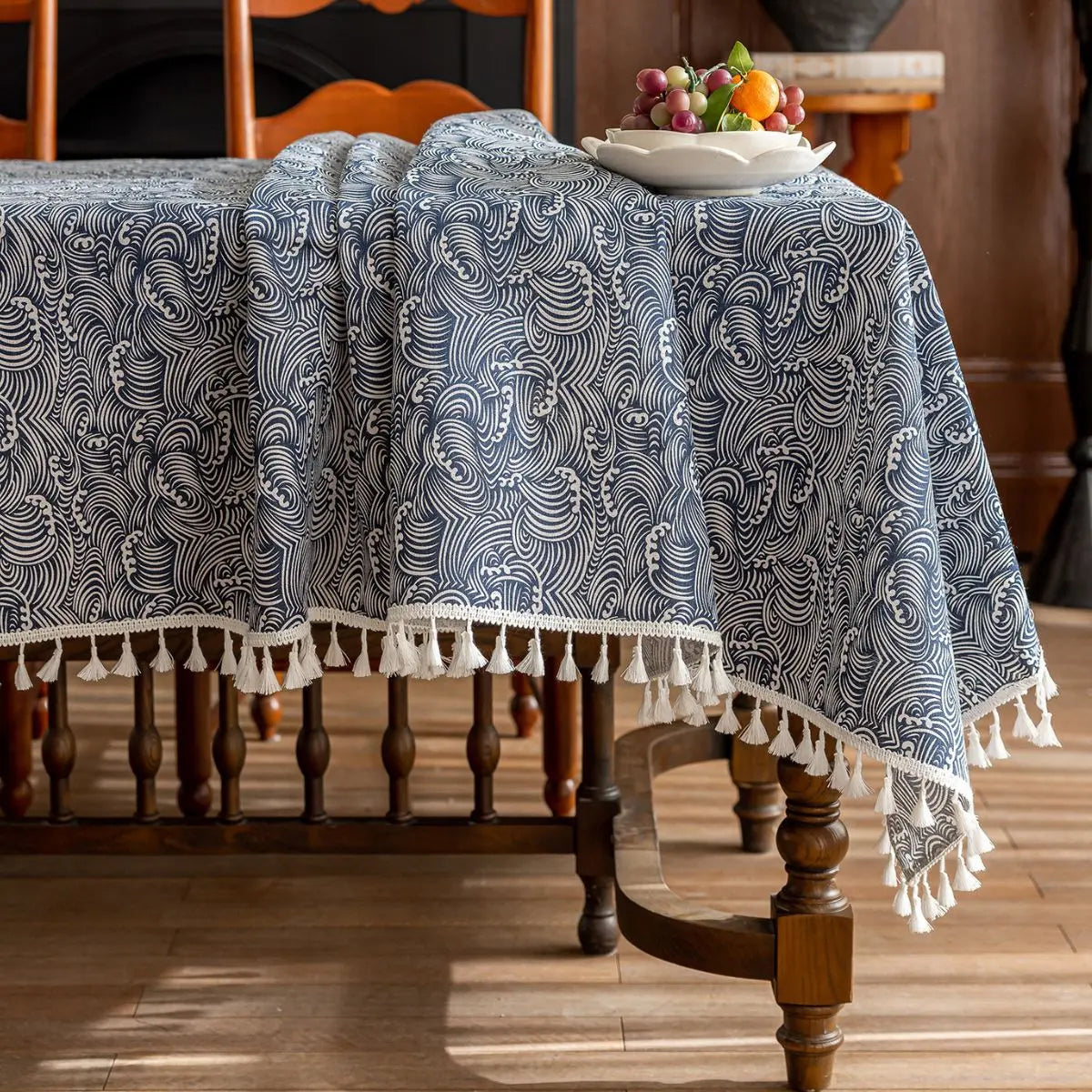 Blue Adelon table cloth and runner featuring intricate patterns and soft fabric for elegant dining decor.